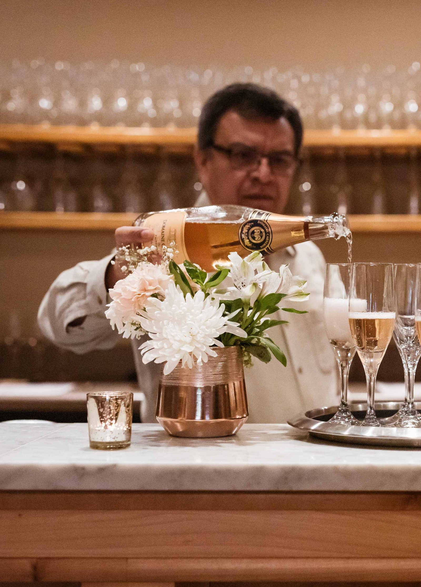 seven branches corporate sommelier poring wine in a fancy glass 1