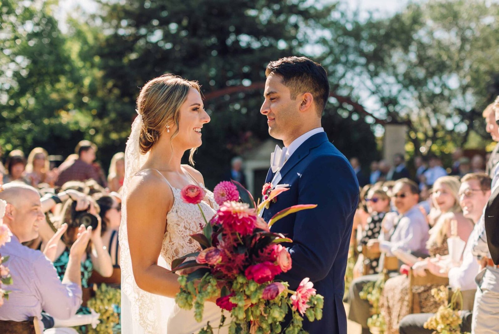 seven branches just married couple lovingly looking into each others eyes