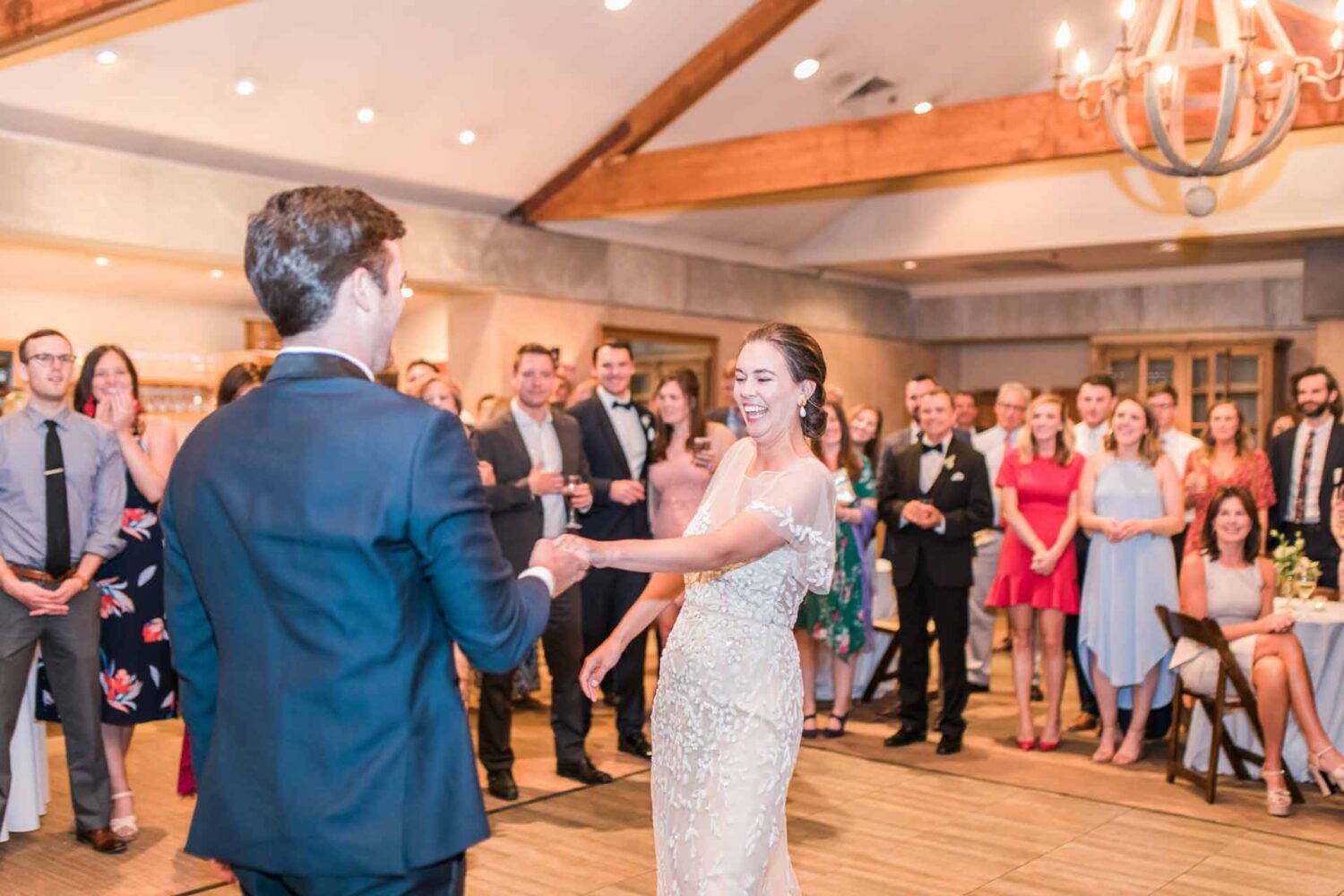 seven branches just married couple rocking it out in the dance floor sorrounded by a lot of people