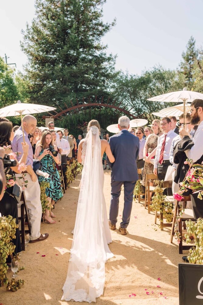 seven branches the courtyard father walking with her daughter down the aisle giving her to her future husband