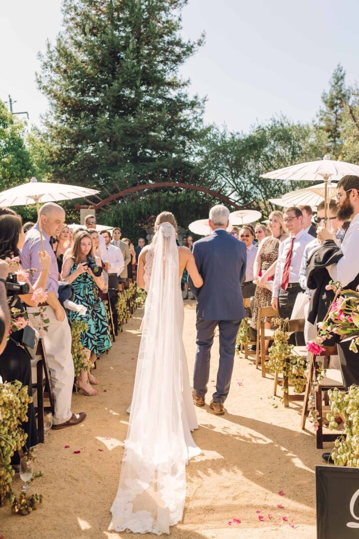 seven branches the courtyard father walking with her daughter down the aisle giving her to her future husband