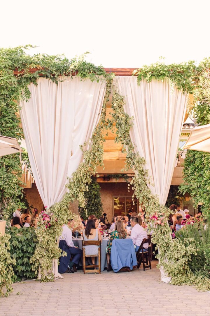 seven branches the patio people sitting in the party hall eating