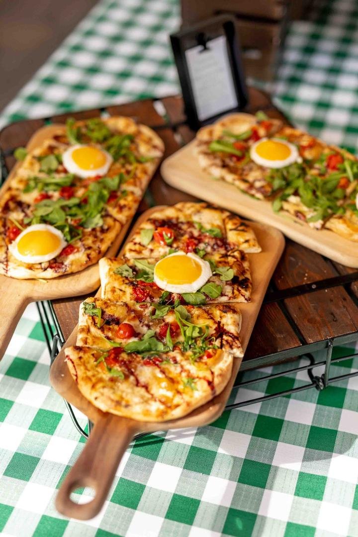 Pizzas On Wood Serving Dishes